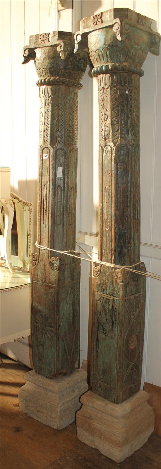 Pair carved painted Indian posts